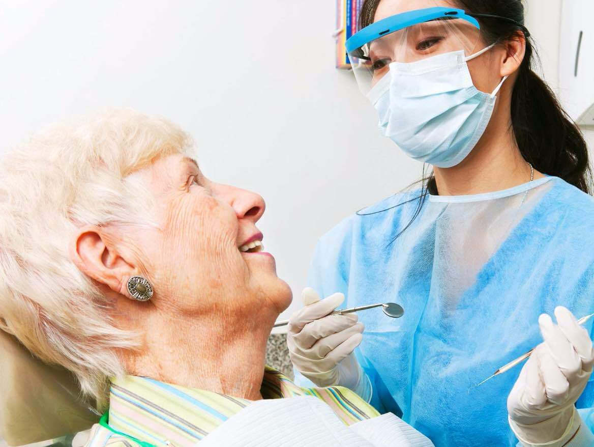 image of patient and dentist