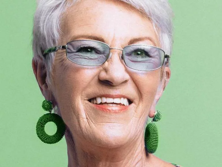 an image of an older women with dental crowns